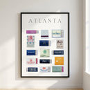Framed Atlanta Matchbox Print hanging on a white wall, showcasing detailed artwork in a sleek black frame with acrylic front.
