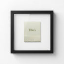 Detailed close-up of Elio’s Framed Print highlighting the textured high-quality paper and elegant wood frame with natural soft lighting.