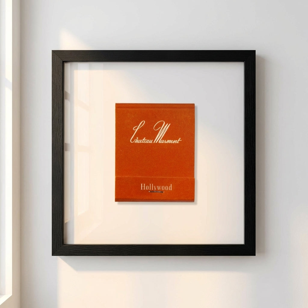 High-resolution close-up of Chateau Marmont Hollywood framed print with textured matte paper and sleek black frame, highlighting details and modern design.