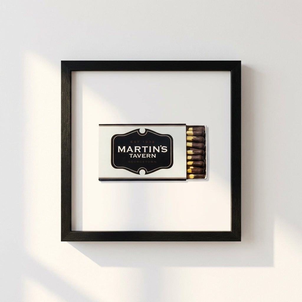 Detailed shot of Martin's Tavern framed print from a lower angle, highlighting textured frame, glossy and matte surfaces, in a warm, inviting setting.