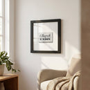 Framed Church & Union print hanging in a cozy living room with warm natural light.