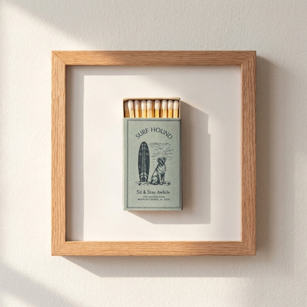 Full-frame shot of Surf Hound poster with wood frame, showcasing sharp details, true colors, and warm natural lighting in a relaxed space.