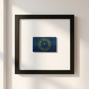 Close-up of Doar Brothers framed print on white wall with textured wooden frame and crisp paper details in a warm, cozy environment.