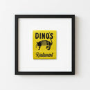 Lifelike 'Dino's' framed poster mounted on a white wall in a relaxed room with warm natural sunlight, showcasing rich colors and textured paper.