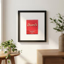 Highly detailed photograph of 'Dove’s Chicago' framed print on white wall, showcasing micro-texture and vibrant details in a cozy, well-lit interior.