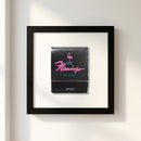 Vibrant Flamingo Las Vegas poster framed in a sleek 0.75-inch wooden frame, mounted on a wall with natural lighting, showcasing high-quality print details.