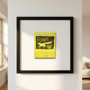 High-resolution photograph of 'Foxy's BVI' framed print on white wall, highlighting textured paper and elegant wooden frame in a cozy living space.