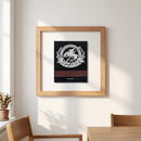 Full view of Griffon Framed Print on wall in cozy setting emphasizing wood frame and textured finish.