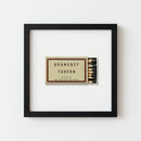 High-quality framed print of Gramercy Tavern on a white wall, with a wooden frame and glossy-matte finish in cozy natural light.