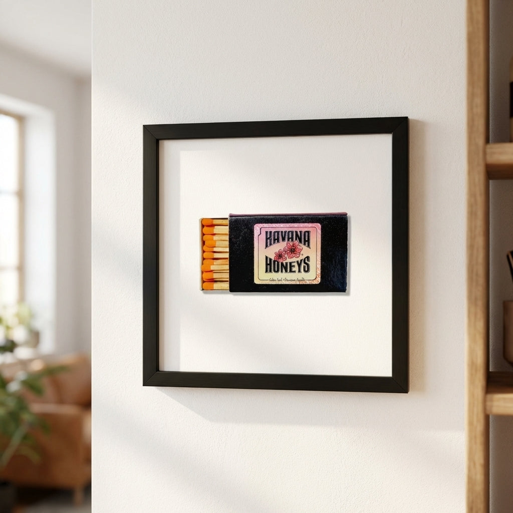 High-resolution image of Havana Honey's framed poster mounted on a white wall, showcasing the thick wooden frame, natural lighting, and inviting home decor.