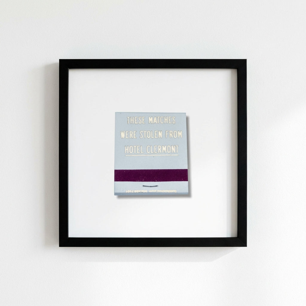 High-resolution image of Hotel Clermont Framed Print on a white wall in a contemporary room with soft natural light and stylish decor.