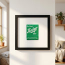 High-resolution photo of Kenzinger poster in an elegant ayous wood frame, hanging on a white wall with warm natural lighting in a cozy environment.