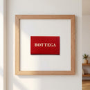 High-resolution image of Bottega framed print in a warm living room setting, highlighting natural light and textured paper details.