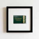 High-resolution 14x14 inch Locanda Verde framed print on wall, showcasing textured paper and professional composition in cozy, well-lit space.