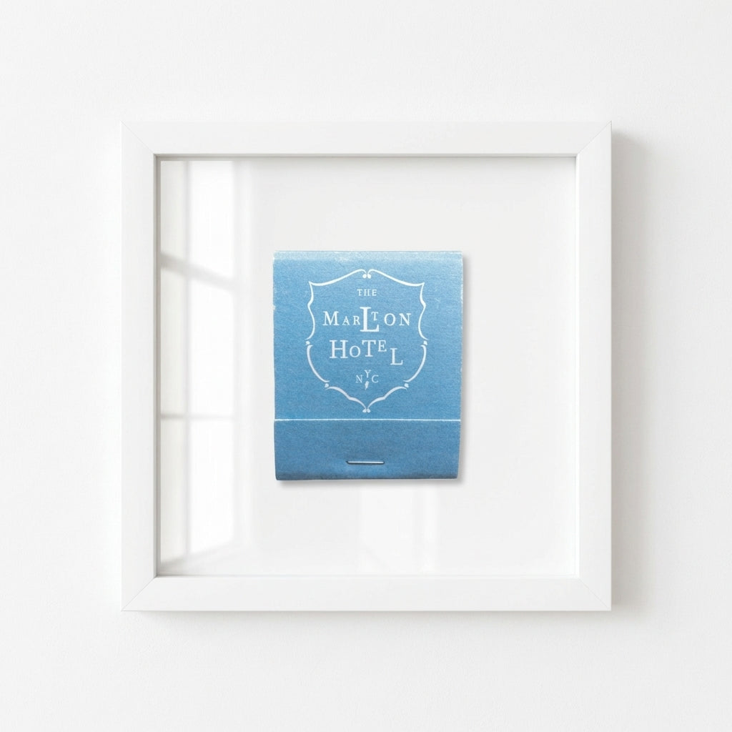 Studio-style display of Marlton Hotel framed print on white background, highlighting paper thickness, clean construction, and acrylic clarity in natural light.
