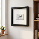 Halls framed print on white wall in modern interior with natural daylight, highlighting paper textures and warm tones.