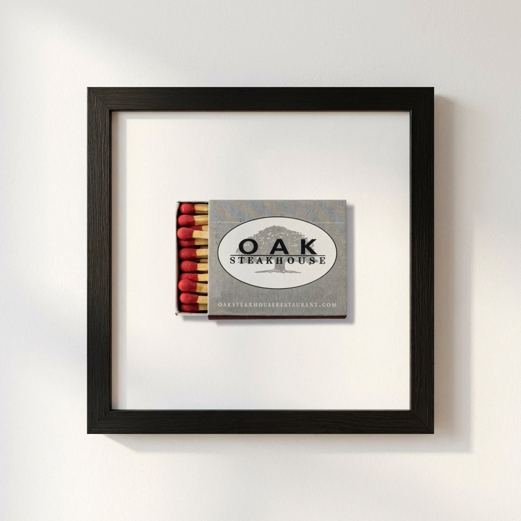 10x10 inch Oak Steakhouse framed print in white frame hanging on a white wall, illuminated by soft natural light, highlighting crisp textures and color fidelity.