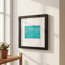 High-resolution image of The Friend framed print outdoors on a white wall, with natural daylight highlighting the frame's craftsmanship and textures.
