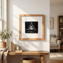 Full-frame view of Owl Bar Chicago poster in 14x14-inch size with wood frame, displayed on white wall in warm, cozy setting with natural sunlight.