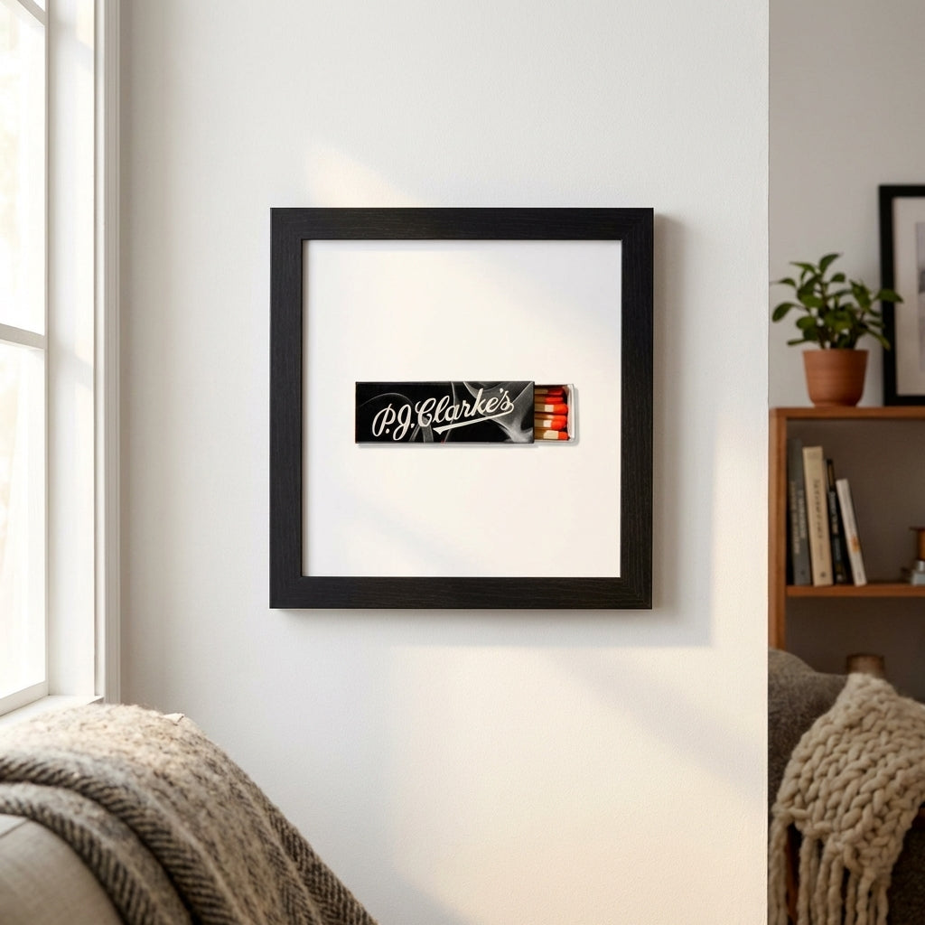 High-resolution image of PJ Clarkes framed print in a cozy living area, illuminated by warm natural daylight highlighting vivid colors and detailed textures.