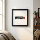 High-resolution image of PJ Clarkes framed print in a cozy living area, illuminated by warm natural daylight highlighting vivid colors and detailed textures.