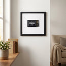 Sharp image of Cocktail Club framed print displayed on a white wall in a warm, inviting room with natural lighting and detailed textures.