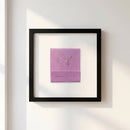 Elegant framed 'Prunella' art print hanging on white wall, showcasing high-quality paper texture and wooden frame with acrylic front.