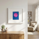 Elegant Rosa Mexicano framed print displayed on a white wall in a cozy living room with natural warm light, showcasing high-quality glossy and matte finish.