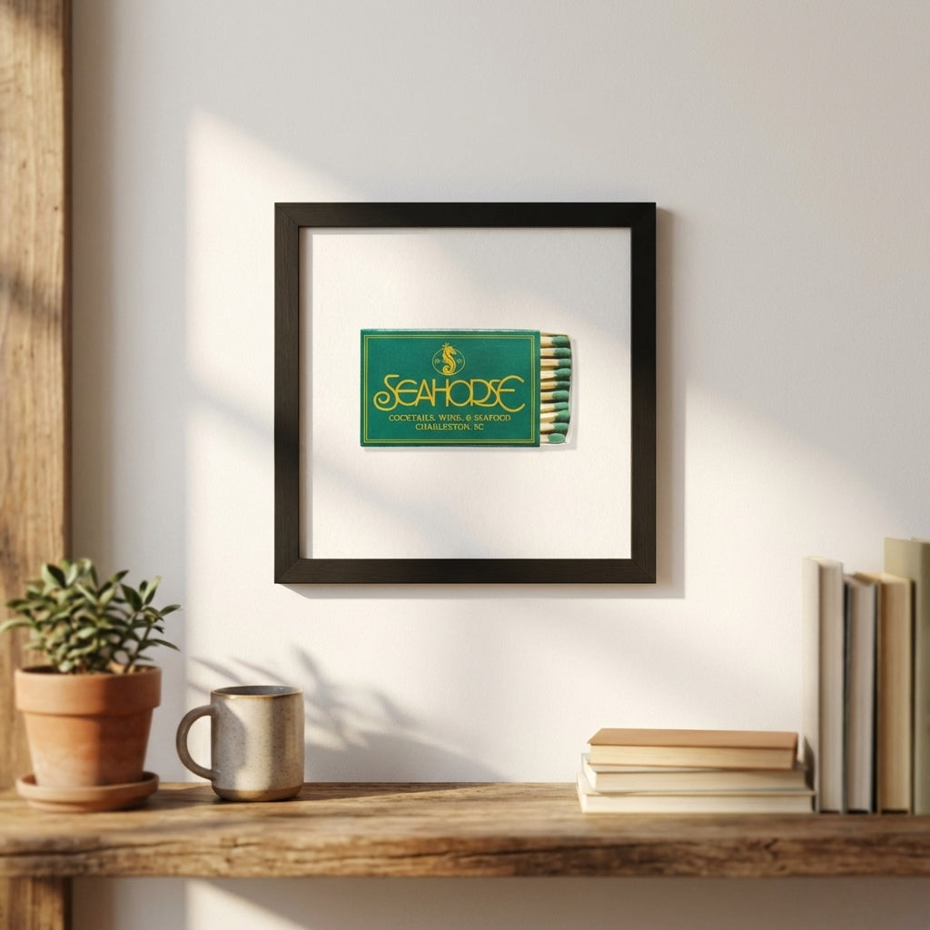 Full-body view of 'Seahorse' framed poster mounted on white wall in cozy natural-lit interior scene.