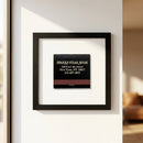 Framed Sparks Steak House Matchbox poster hanging on a white wall, showcasing warm natural light and texture details.