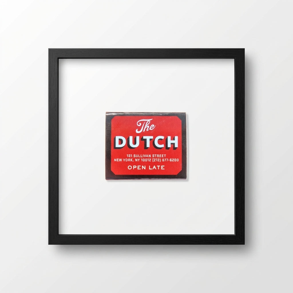 High-resolution image of 'The Dutch NYC' framed poster in a gallery setting, highlighting surface textures, craftsmanship, and natural shadow effects.