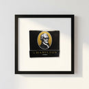 High-quality framed poster of The Hamilton on a white wall, illuminated by natural window light, showcasing detailed micro-texture and wood frame.