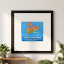 Realistic image of 'The Lodge Chicago' framed print with detailed wood frame, showcasing natural lighting and high-quality paper textures.