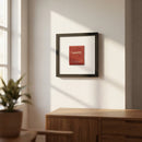 Framed wall art of The Penrose Matchbox, on a white wall, showcasing high-quality paper and wooden frame with glossy and matte finishes