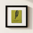 High-quality framed poster of The Rarebit artwork hanging in a cozy, modern living room with natural light and soft shadows.
